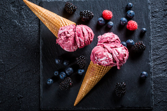 Tasty berry fruits ice cream in waffels