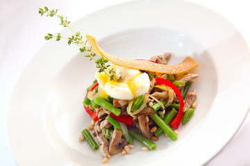 Salad with poached egg