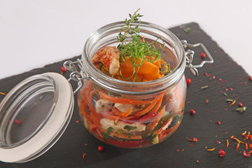 vegetables in the pot on the black plate