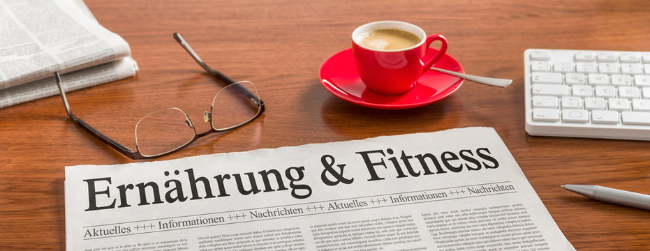 Zeitung auf Schreibtisch - Ernährung und Fitness