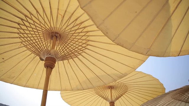 tropical beach umbrella or parasol, vintage style : panning HD