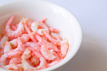 the shrimp in the bowl closeup on white background