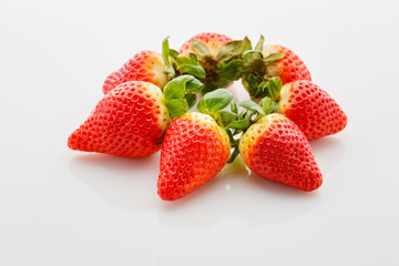 Closeup of not fully ripe strawberries
