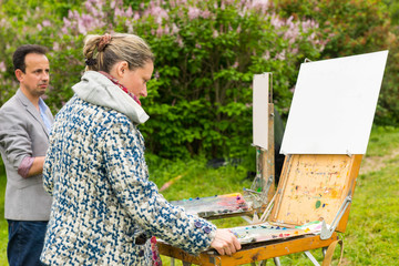 Naklejka premium Couple Of Artists In The Open Air