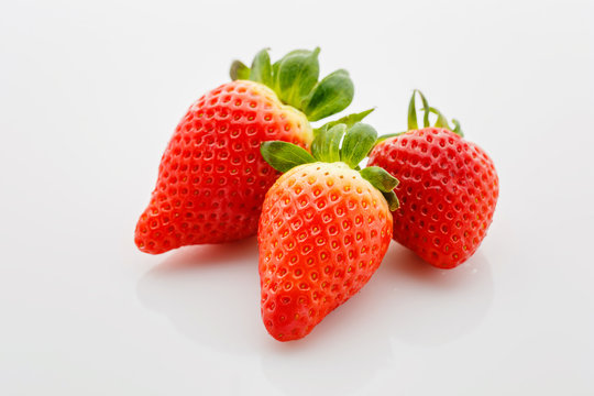 Closeup of not fully ripe strawberries