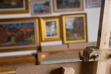 Part of painter's easel in a gallery