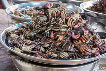 Fermented mangrove crab, street food  in chinatown market, Bangkok, Thailand