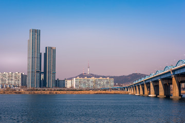 Fototapeta premium Dongjak Bridge and Seoul tower at Han river in Seoul, South Kor
