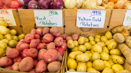 Potatoes at a produce stand. 