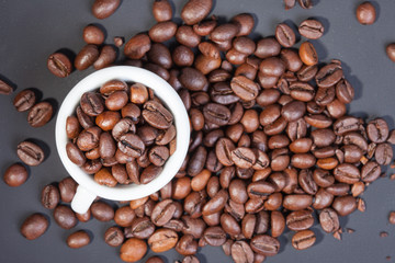 top view white cup full of coffee beans