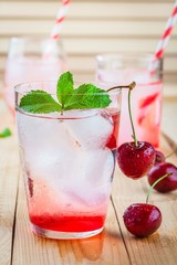 cherry lemonade with ice in glasses