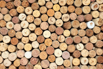 Background of used wine corks, wall of many different wine corks closeup