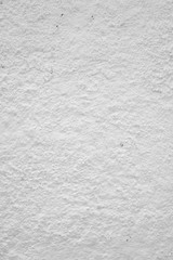 Rough white wall plaster.