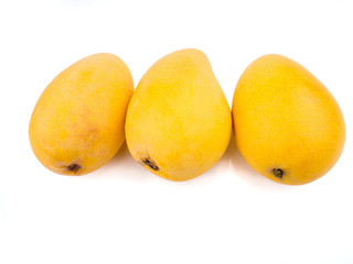 yellow ripe mango isolated on white