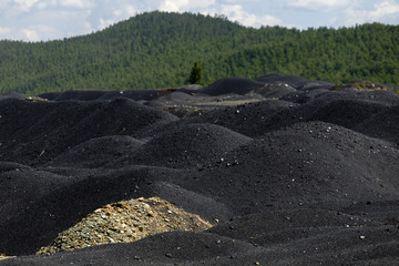 The accumulation of slag after the establishment of the plant.