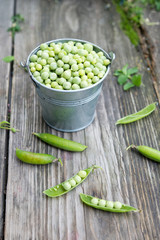 Fresh green peas in pods
