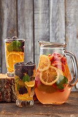 Summer fruit drink on wooden background