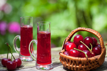 Maraschino liqueur with sour cherries in the basket