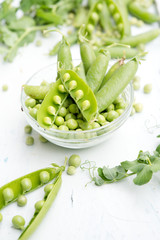 Fresh green peas in pods
