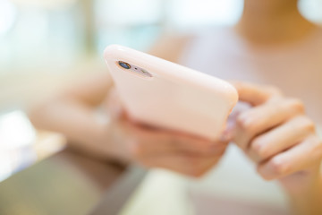 Woman looking at mobile phone