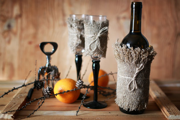 wine bottle and two glasses