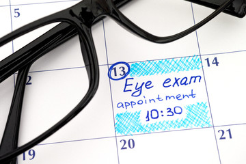 Reminder Eye exam appointment 10-30 in calendar with glasses