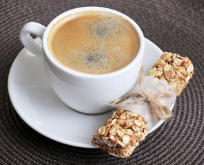 Coffee in White Cup and Granola Bar, Healthy Breakfast, Closeup