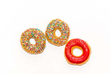 Fresh glazed donuts  isolated on white background, top view