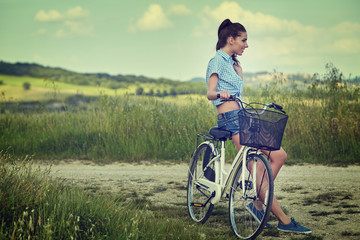 Woman with vintage bike outdoor, summer Tuscany © ZoomTeam