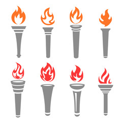 Set of flaming torches isolated on white background,