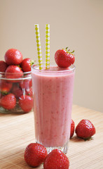 Strawberry smoothie or milkshake in the glass jar, healthy concept