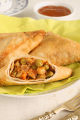 Vegetable Samosas a deep fried Indian snack filled with a spicy vegetable mix