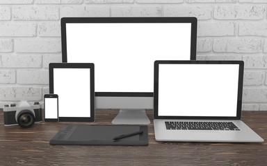 Fototapeta premium Responsive mockup screen. Monitor, laptop, tablet, phone on table in office. 3d rendering.