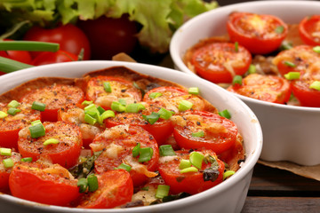 Roasted tomatoes with chives and cheese