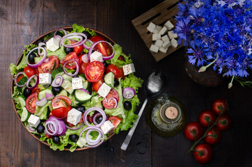 Fototapeta na wymiar Fresh Greek salad in bowl, still life