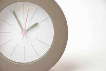 Black clock isolated on a white background