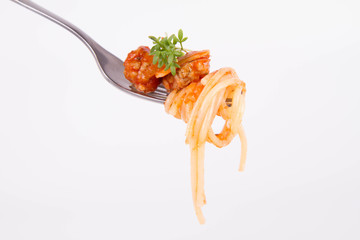 Spaghetti bolognese with garlic on a fork