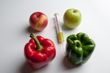 Vegetables and fruits on a white background. In addition to the