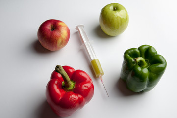 Vegetables and fruits on a white background. In addition to the