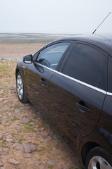 Ford Mondeo on beach