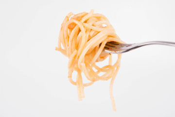Spaghetti bolognese with garlic on a fork
