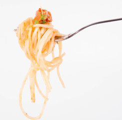 Spaghetti bolognese with garlic on a fork
