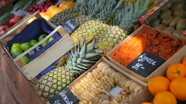 Fruit market with various colorful fresh fruits and vegetables