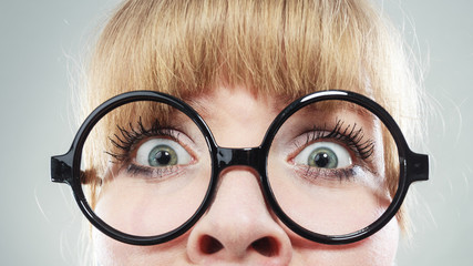 Scared woman with eyes wide open.