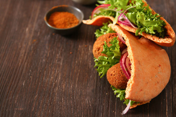 Doner kebab - falafel fresh vegetables in pita Brad