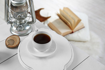 Beautiful winter composition with cup of hot drink