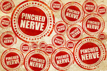 pinched nerve, red stamp on a grunge paper texture
