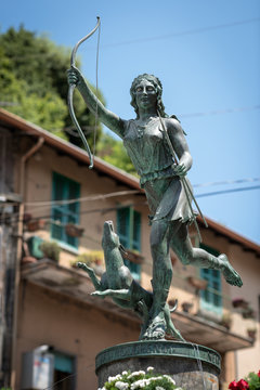 Artemis the Huntress, or Diana the Huntress, statue on top of the fountain at Nemi, a small rural town near Rome, Italy