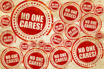 Obraz premium no one cares, red stamp on a grunge paper texture
