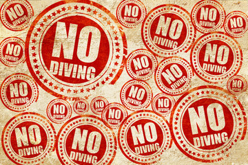 no diving, red stamp on a grunge paper texture